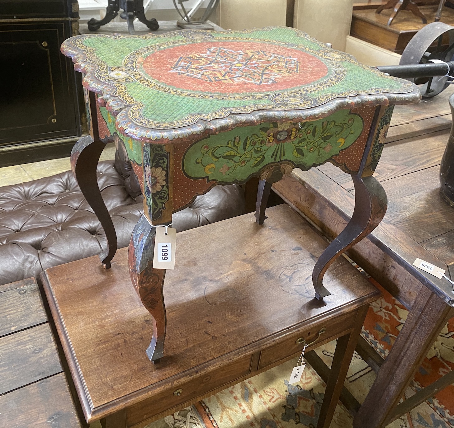 An Eastern European painted low occasional table, width 59cm, depth 46cm, height 57cm